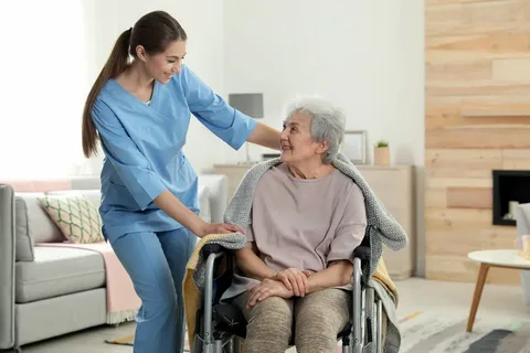 Compassionate caregiver assisting senior client